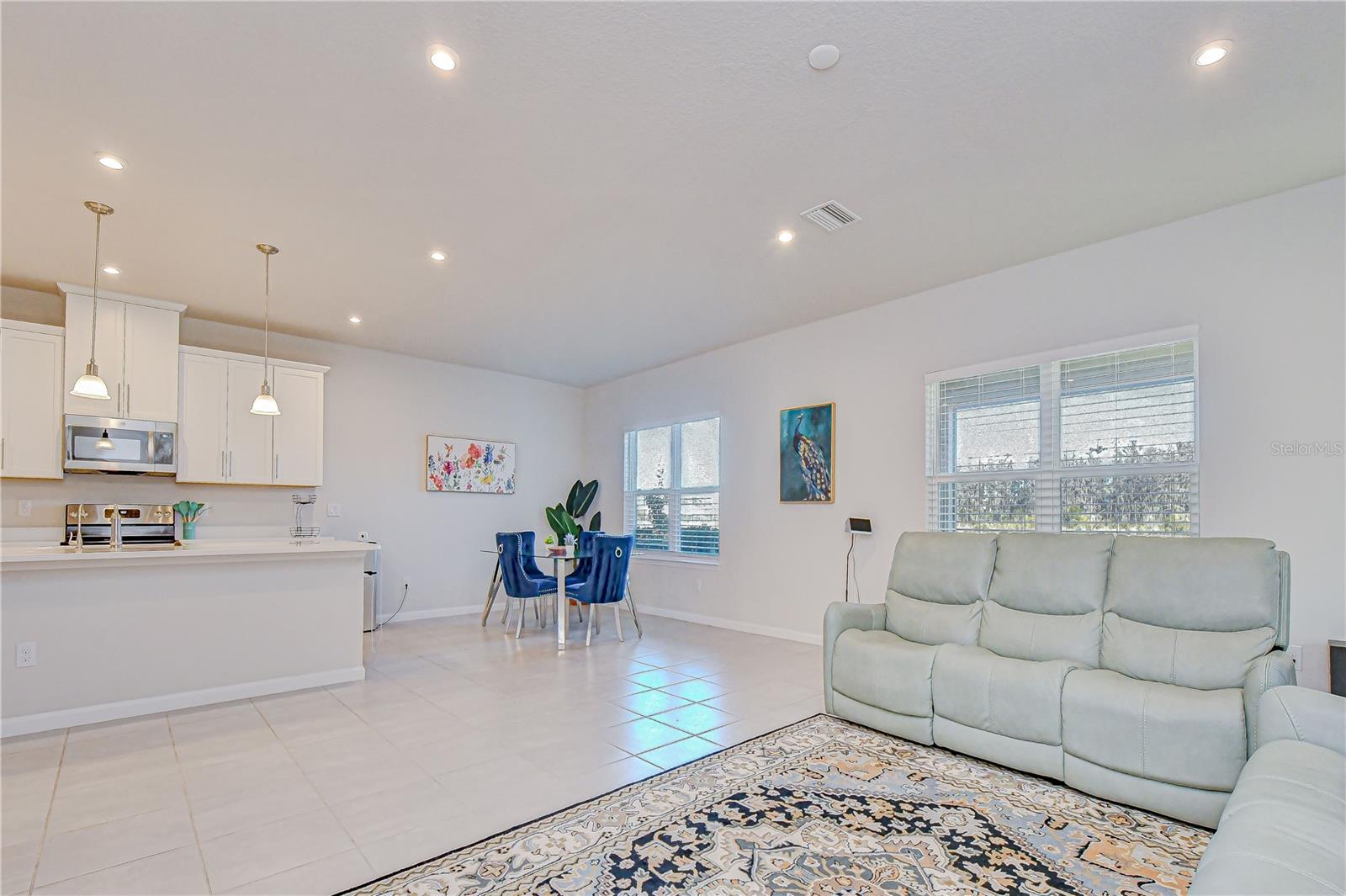 Bright living space overlooking the kitchen and dining area.