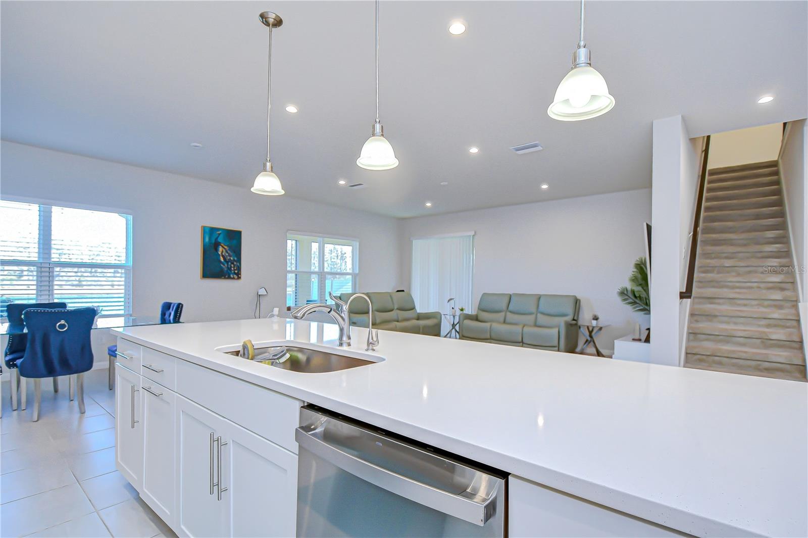 Central island overlooking the living area—perfect for hosting.