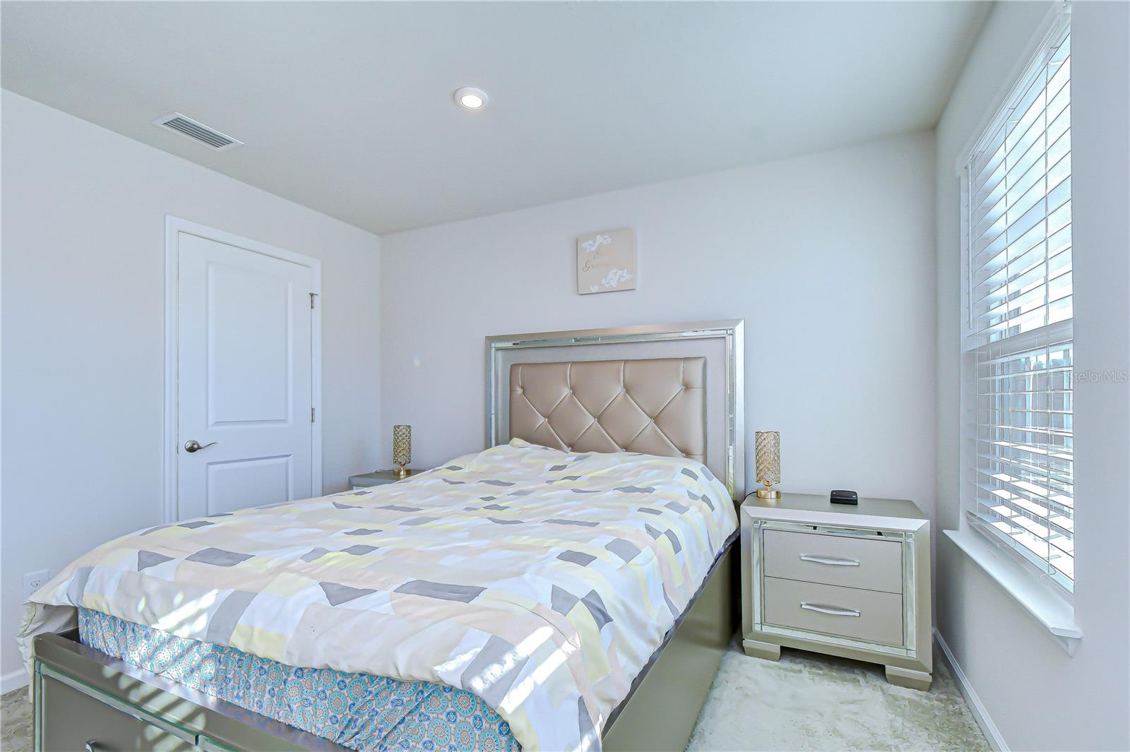 Alternate bedroom view highlighting comfort and space.