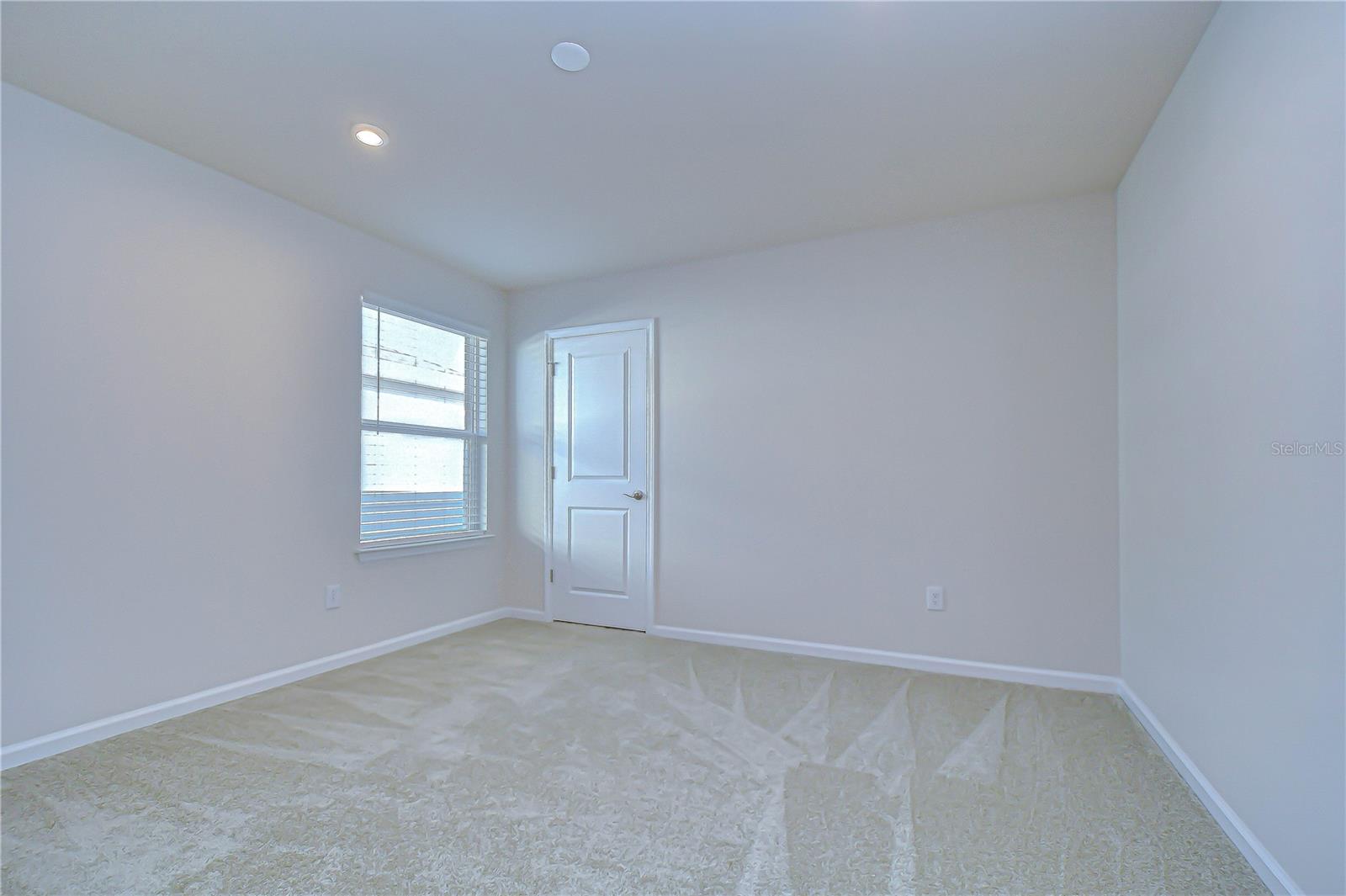 Secondary bedroom with bright, airy appeal.