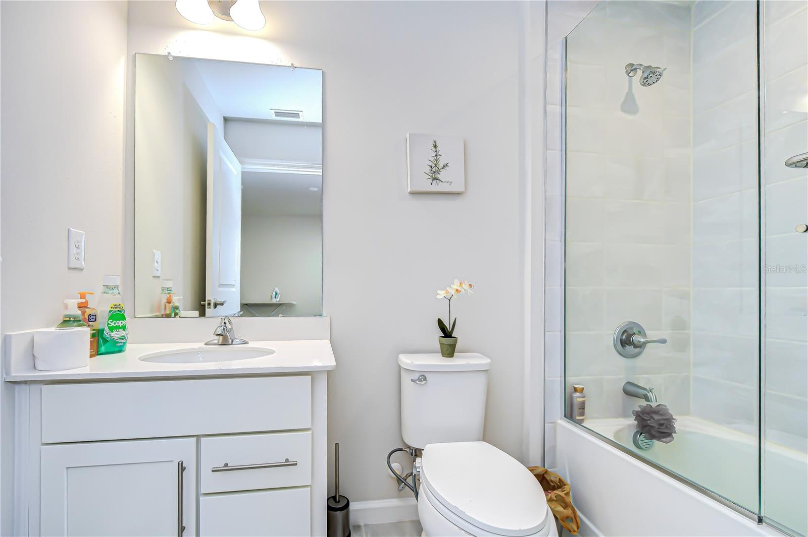 Bathroom equipped with a spacious walk-in shower.