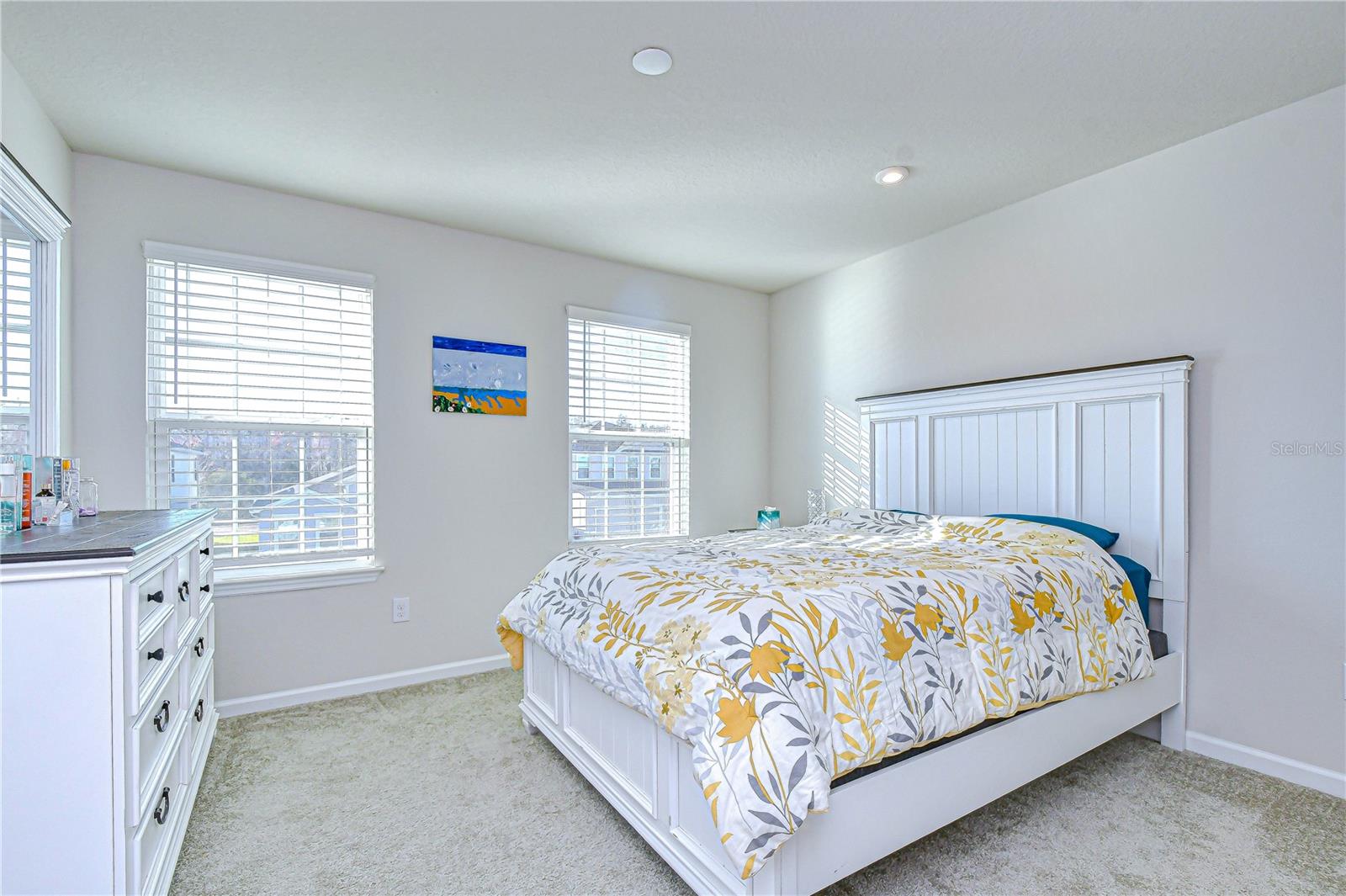 Third bedroom offering natural light and a relaxing atmosphere.