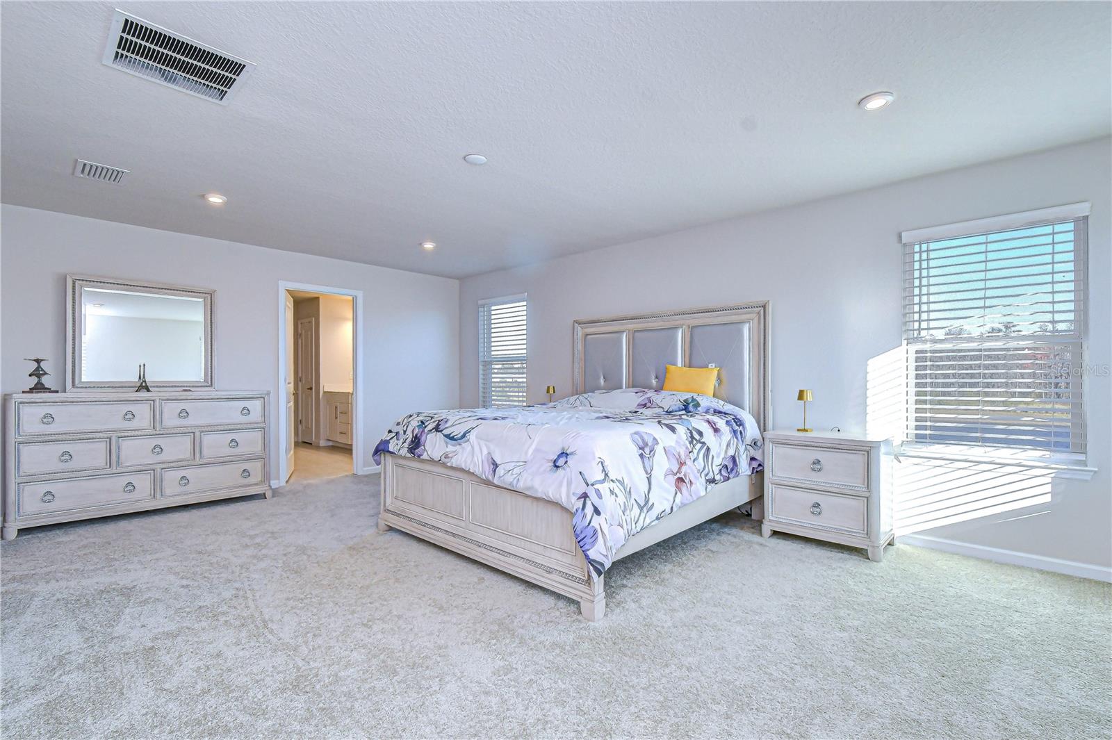 Luxurious primary suite with impressive space.