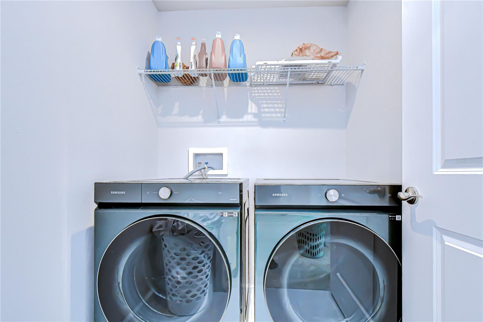 Convenient in-home laundry closet.