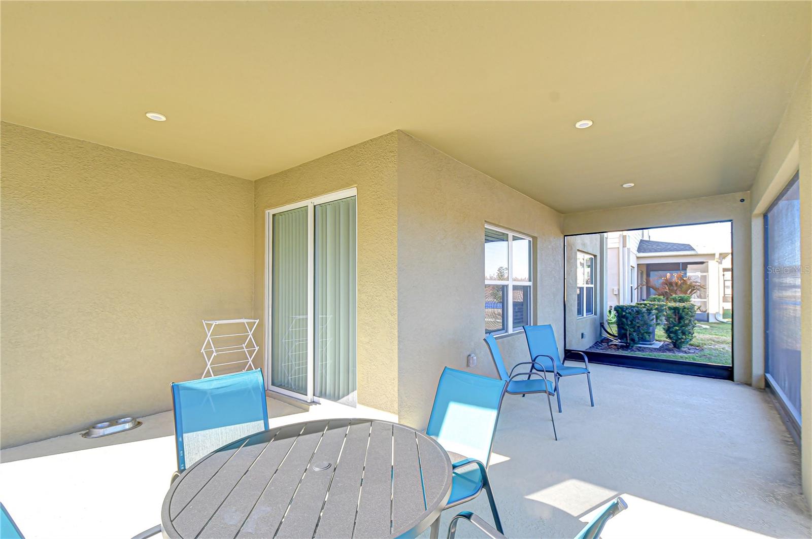 Screened lanai providing a comfortable outdoor retreat.