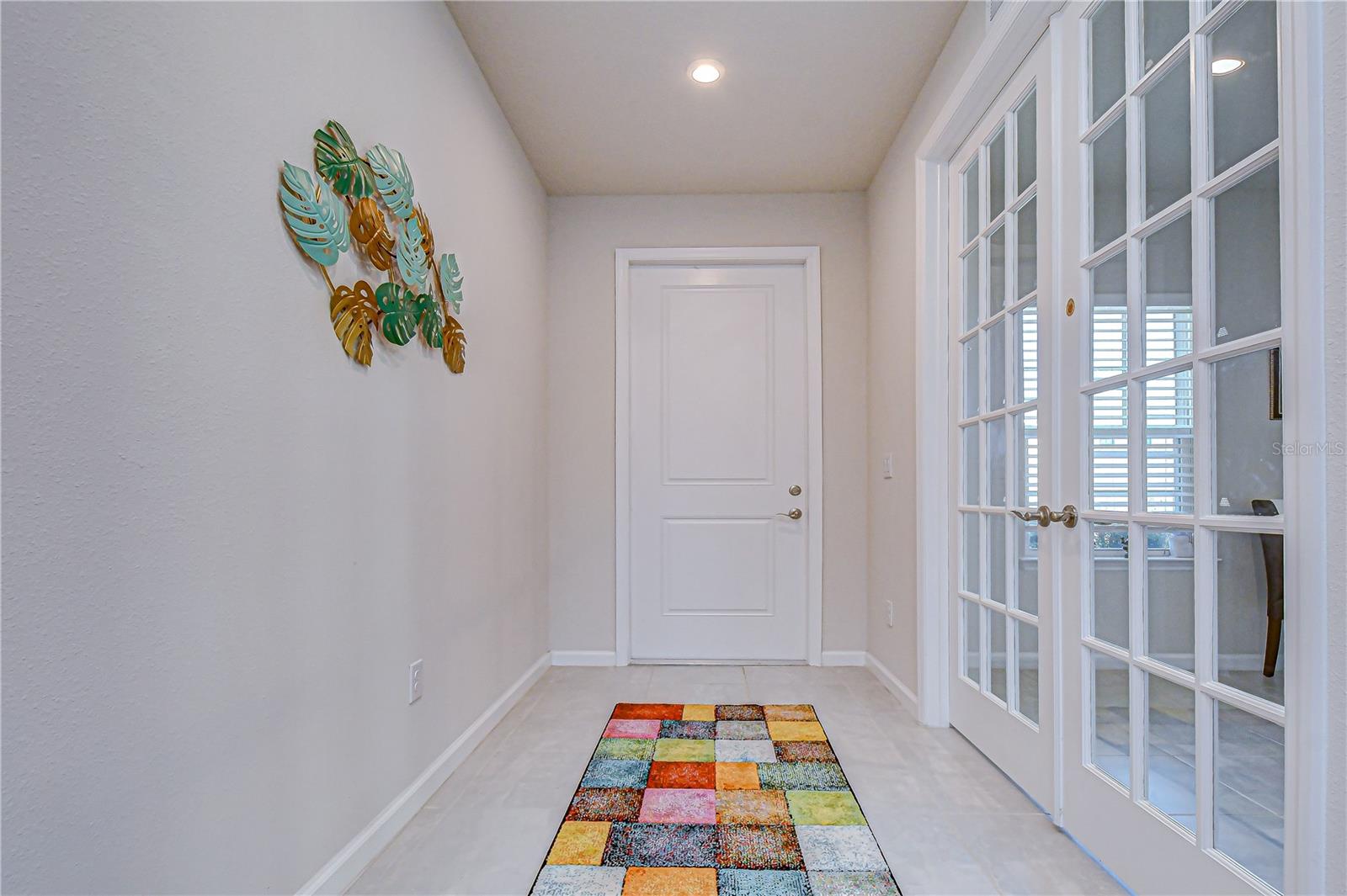 Bright and spacious foyer with an open, welcoming feel.