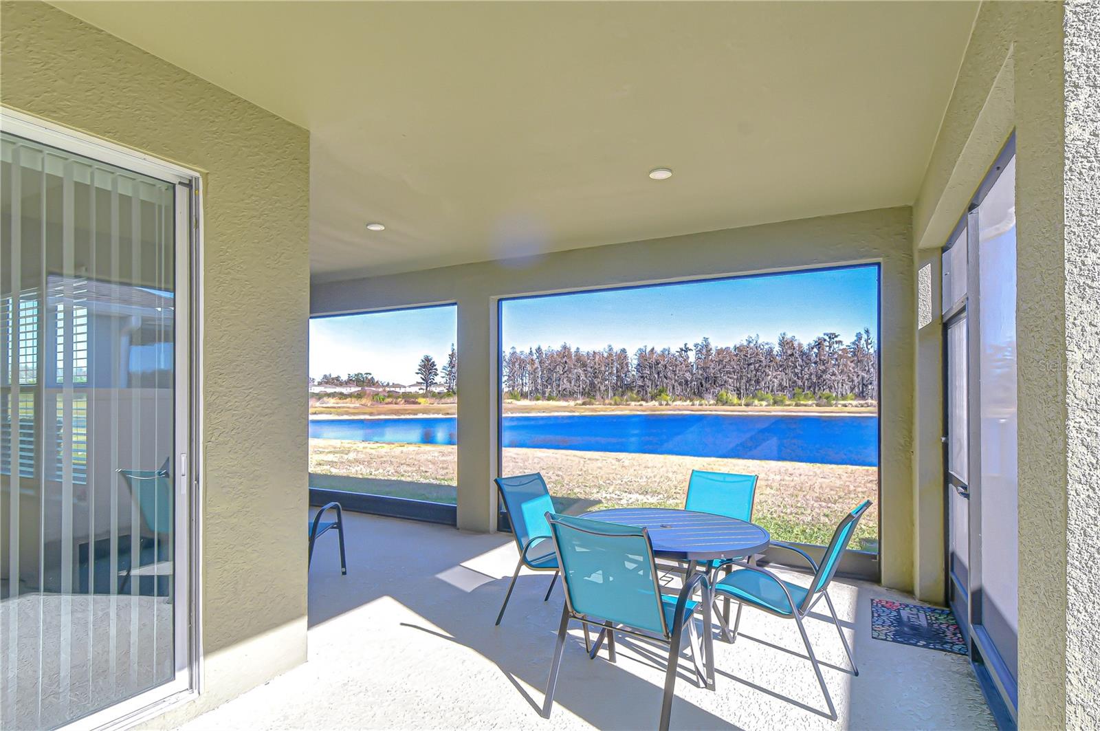 Lanai with tranquil pond views.