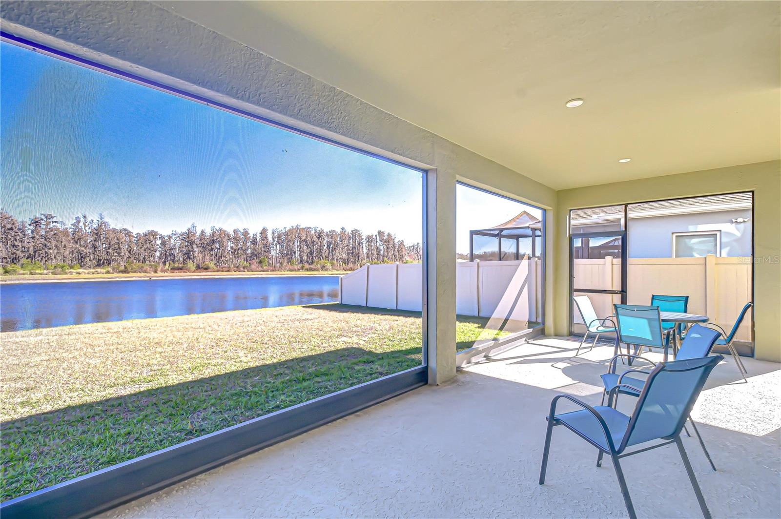 Lanai with tranquil pond views.