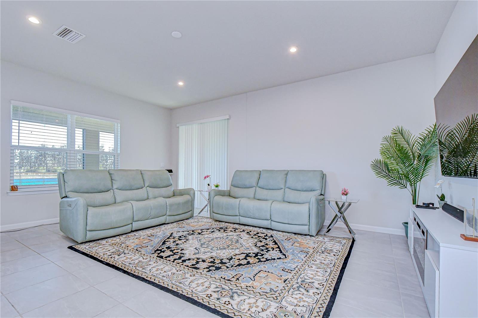 Elegant living room with refined décor and thoughtfully arranged furnishings.