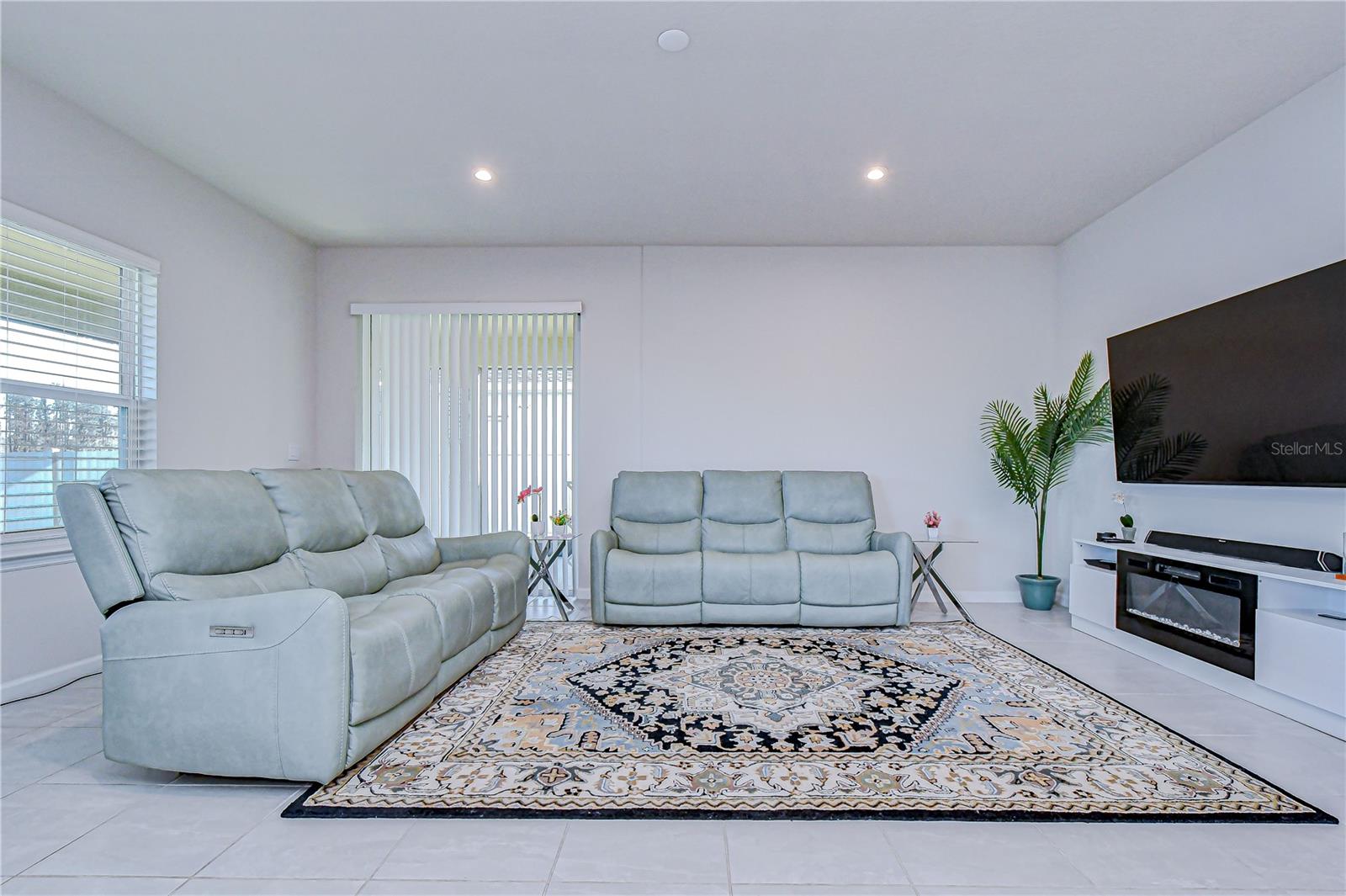 Comfortable living area featuring ample seating and entertainment space.
