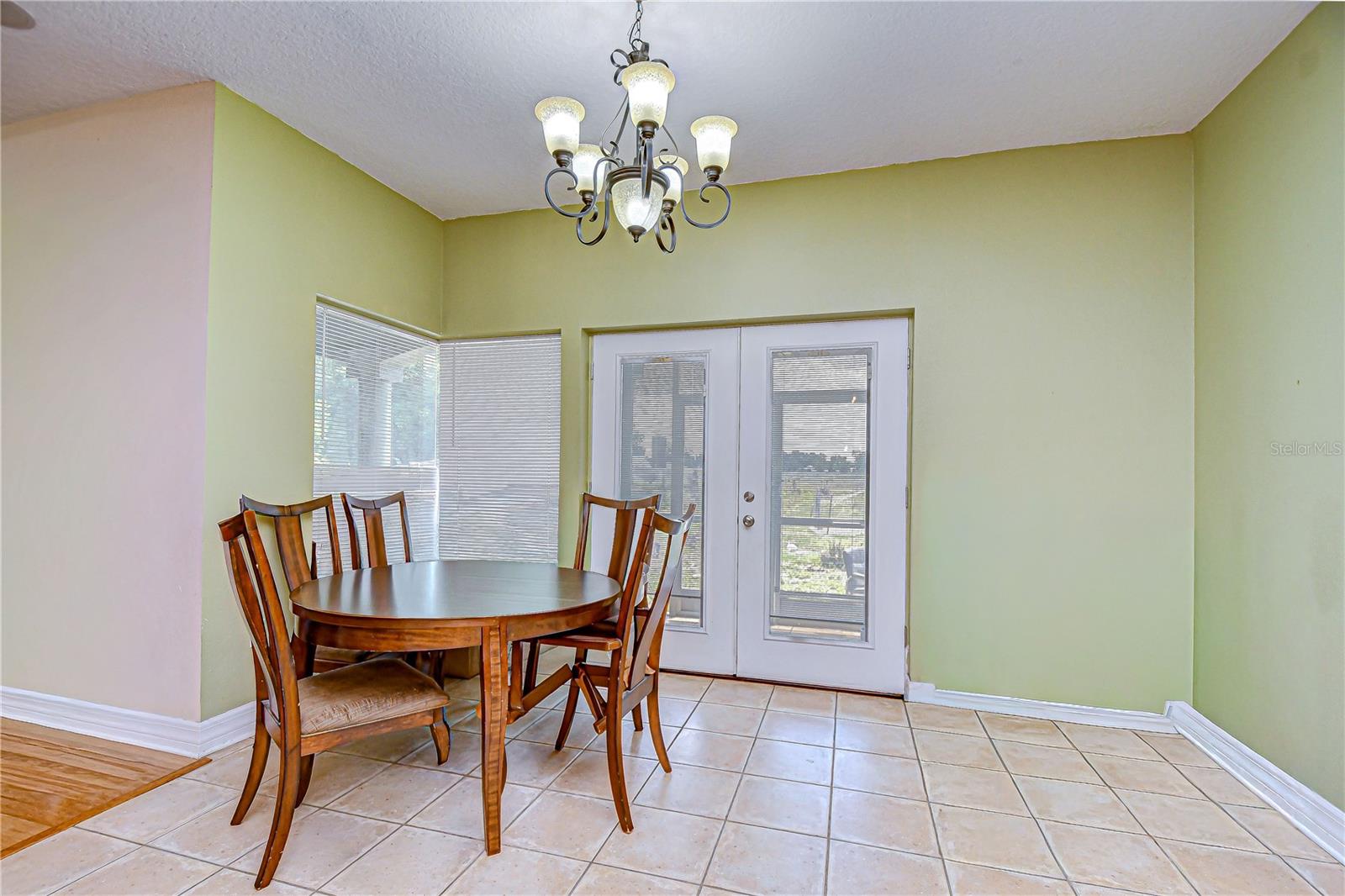 Formal dining with scenic views of the property