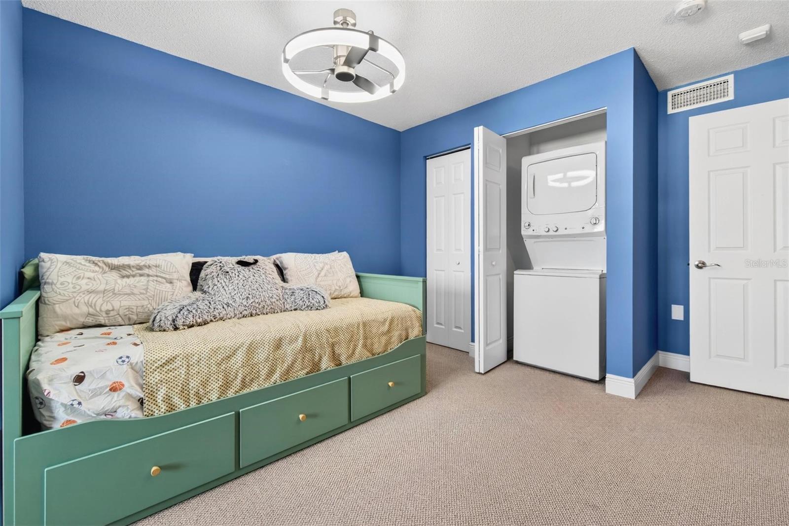 laundry located in second/guest bedroom