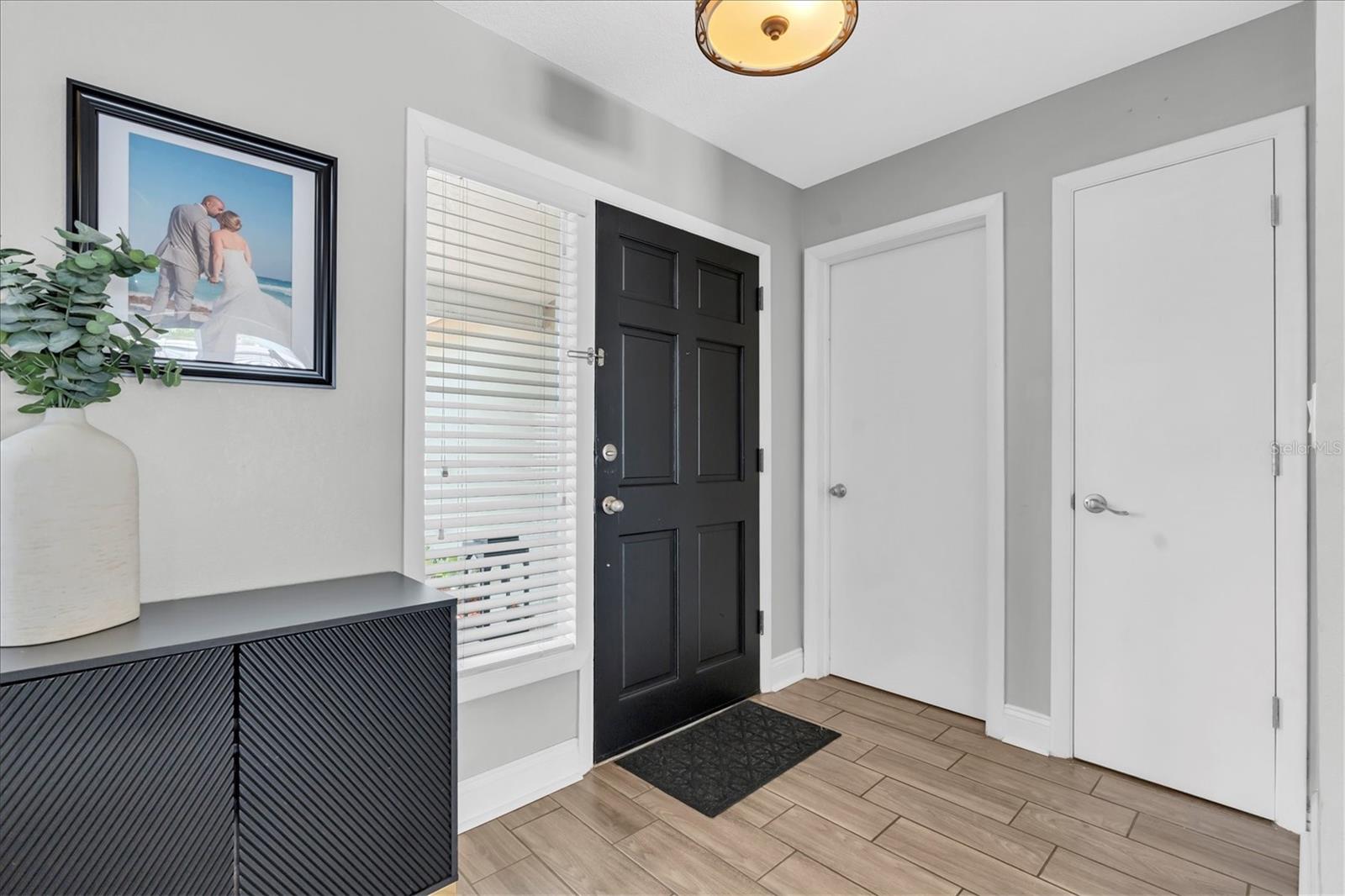 Just inside Front door- Coat Closet - garage acces