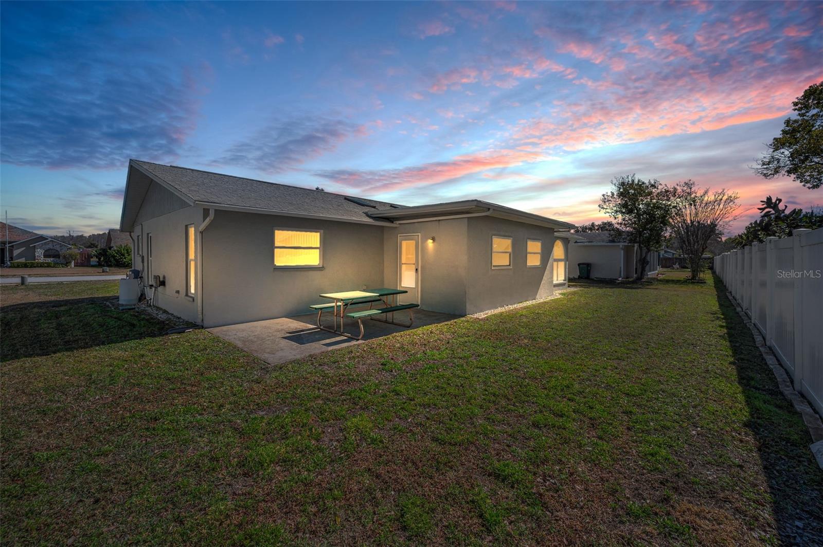 VIEW OF BACK OF THE HOME. ADDITIONAL PRIVACY FENCING IS ALLOWED IN THIS COMMUNITY