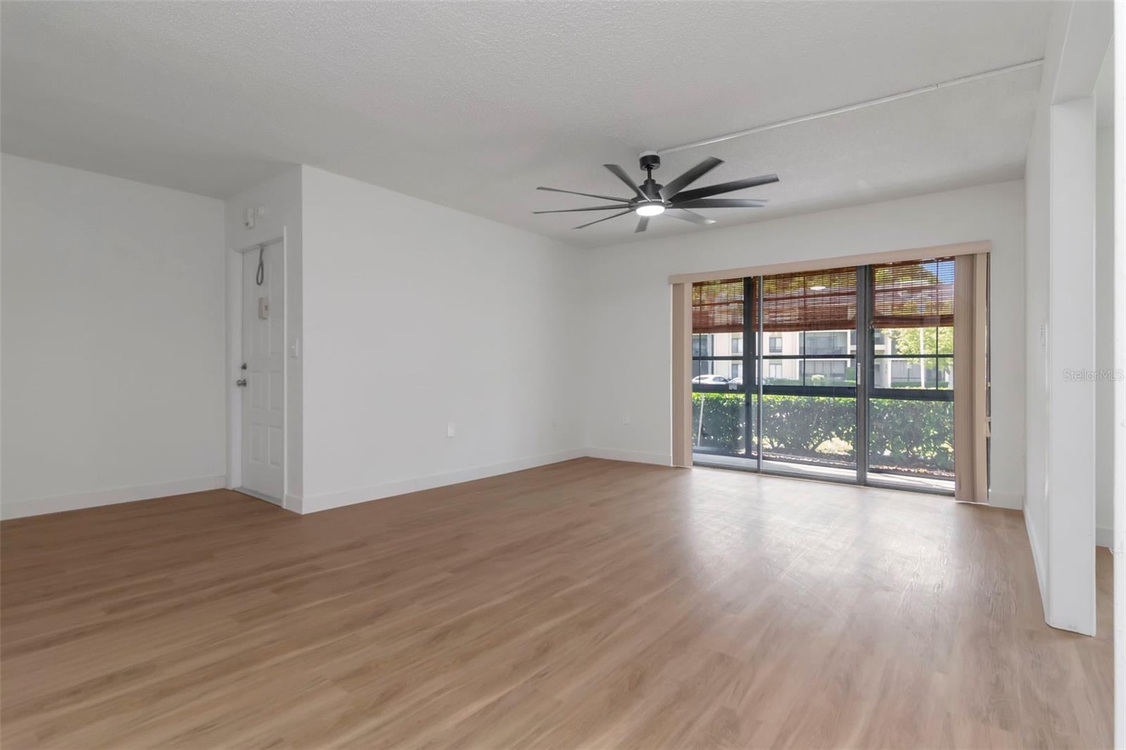 Bright Living Area with Front Patio Access
