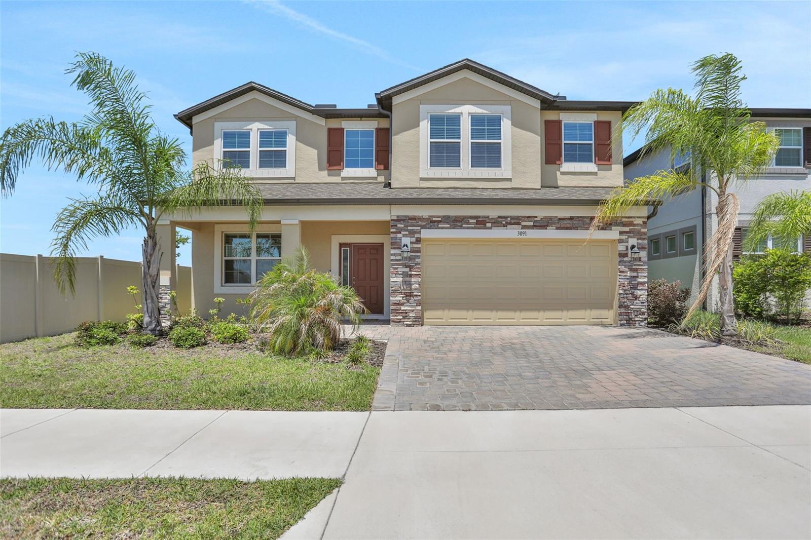 Welcome to waterfront 3091 Marine Grass Drive ... your 5 bedroom, 3-bath, 3-car tandem garage home in Berry Bay