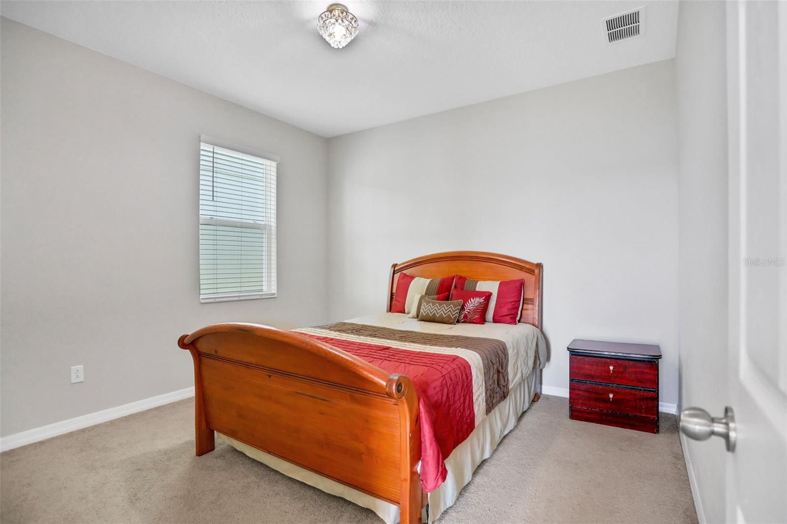 Guest bedroom and full bath downstairs with private exit to back lanai
