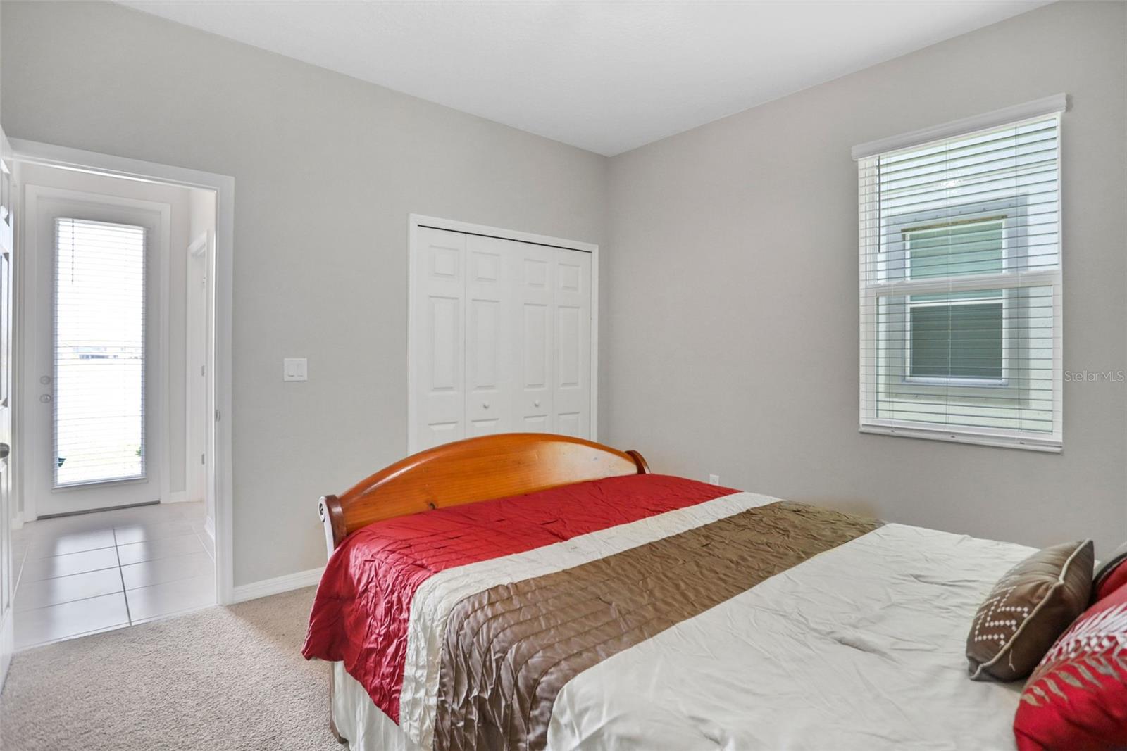 Guest bedroom with full bathroom and exit to back lanai