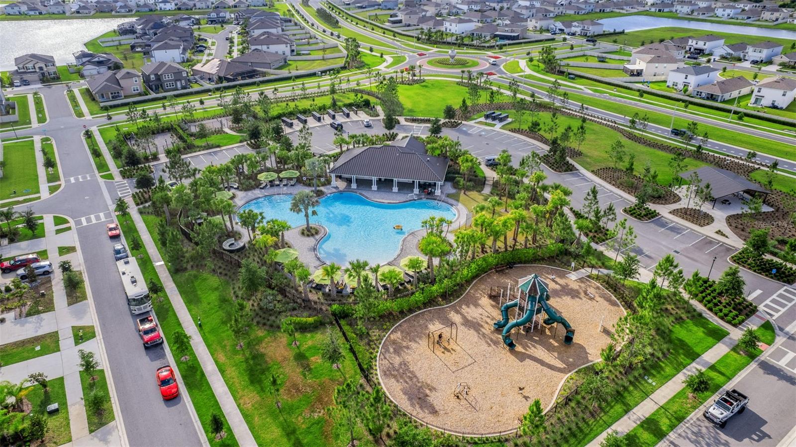 Clubhouse, pool, basketball, dog park, playground,picnic pavilion with grassy play area and more are only 2 streets over