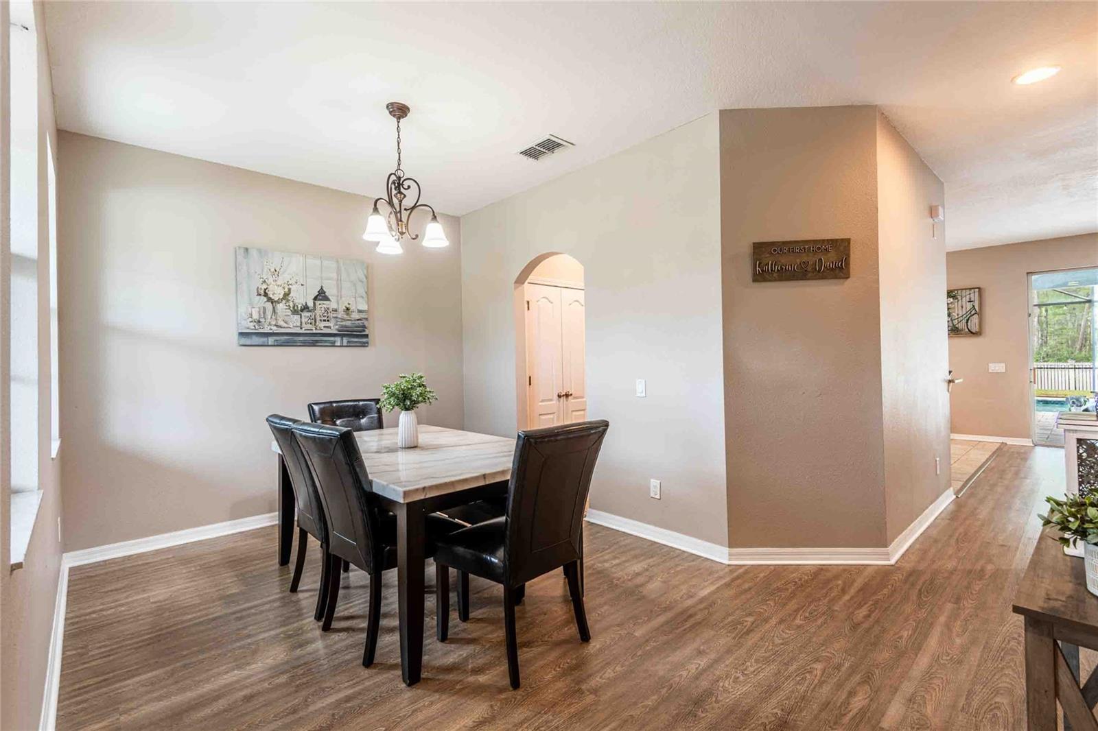 Dining room flows into kitchen and great room.