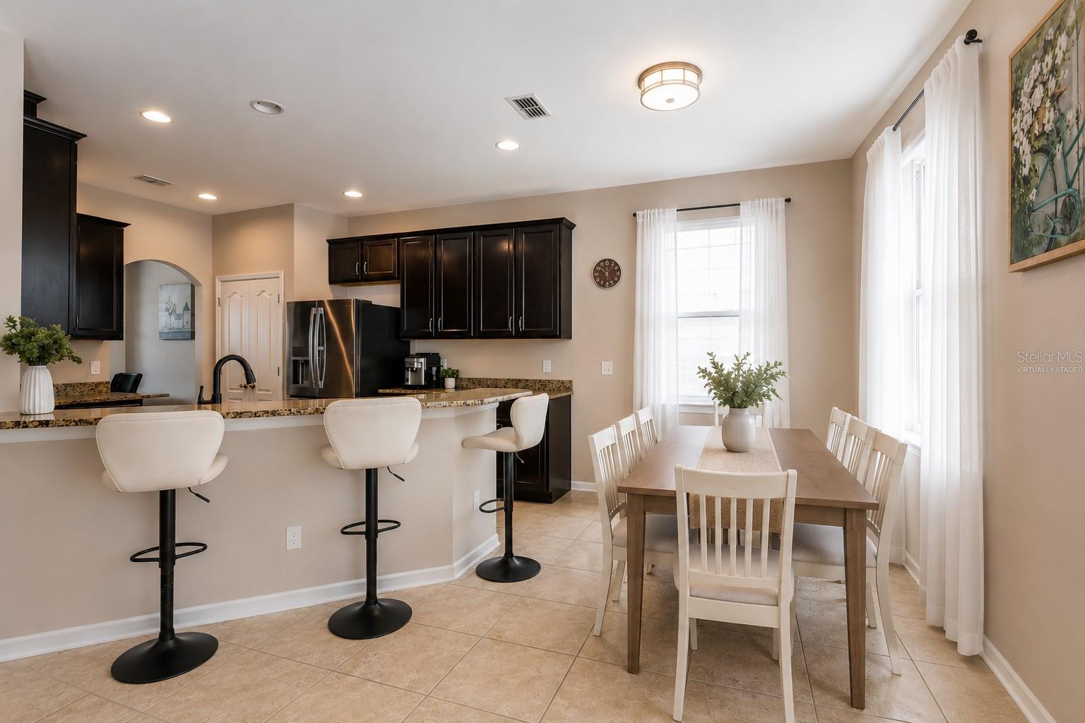 Virtually staged dinette area.