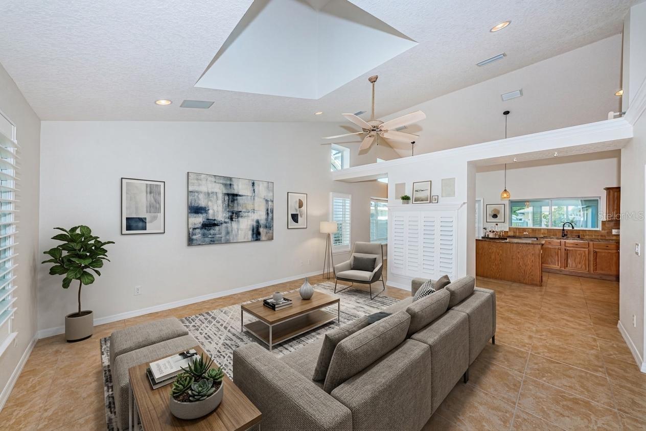 Living room with vaulted ceilings - staged