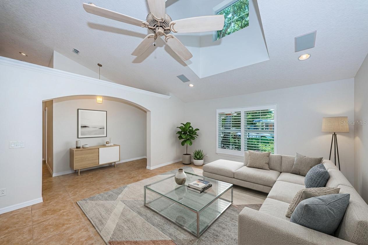 Living room with vaulted ceilings - staged