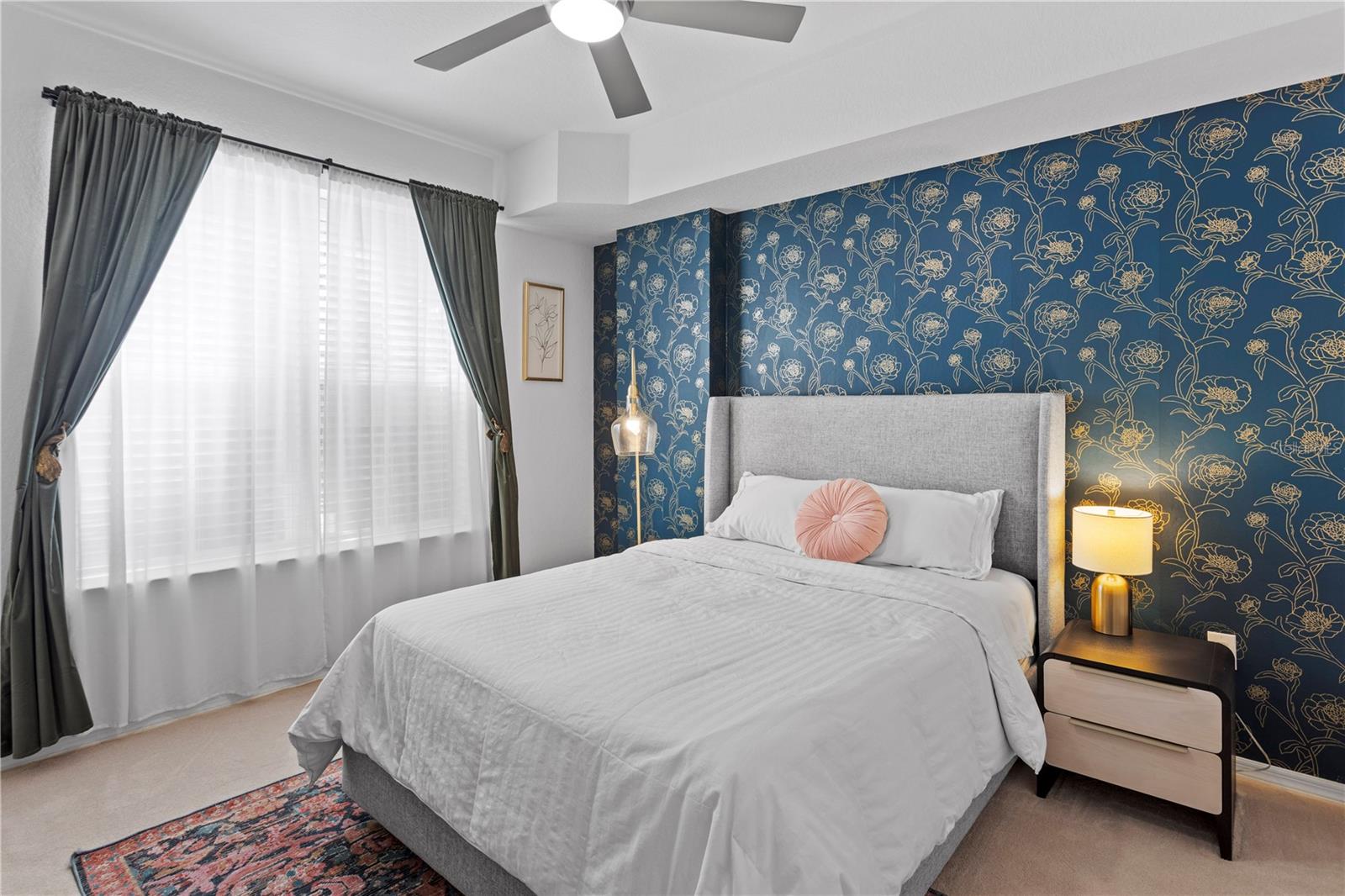 The spacious primary bedroom