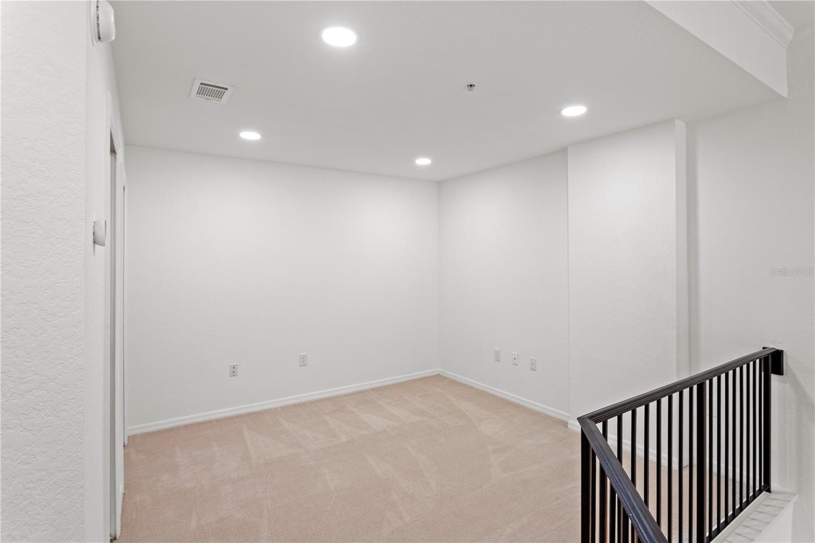 Upstairs, a versatile loft-style second bedroom or office provides the flexibility to suit your lifestyle.
