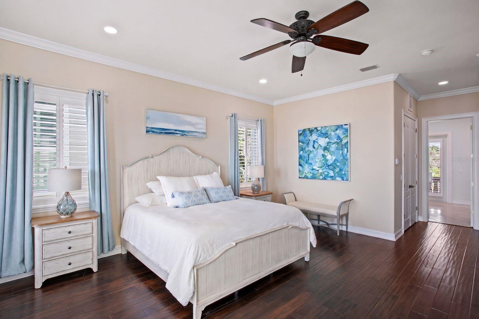 Alternate view of the main level, primary suite, showcasing the entrance to the ensuite.