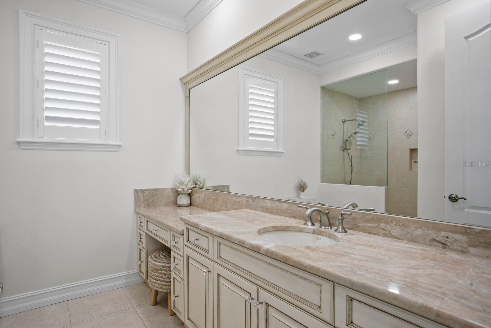 Top level bedroom two, ensuite with expanive vanity.