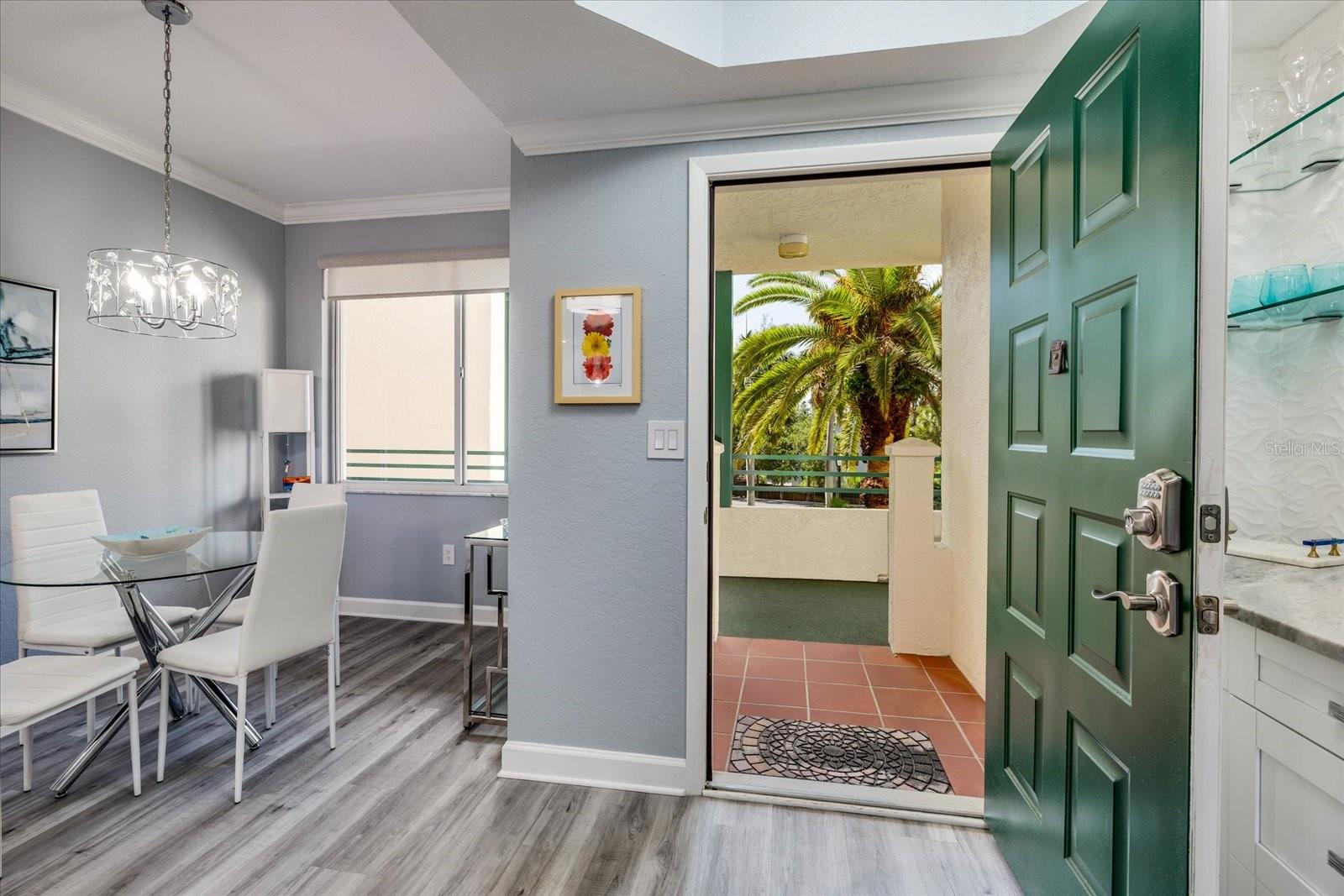 Dining area & entrance to condo