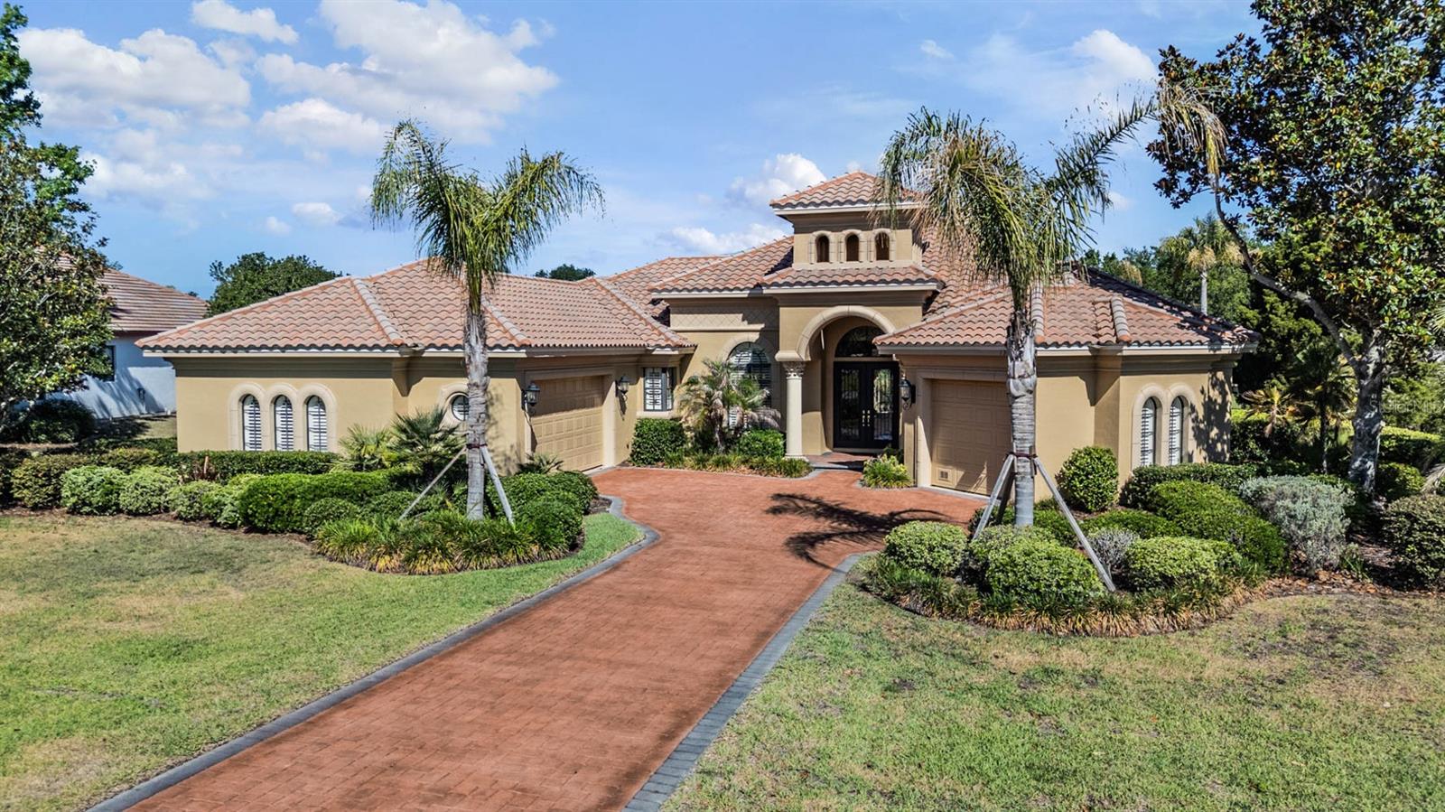 Elongated paver driveway to park family & friends!