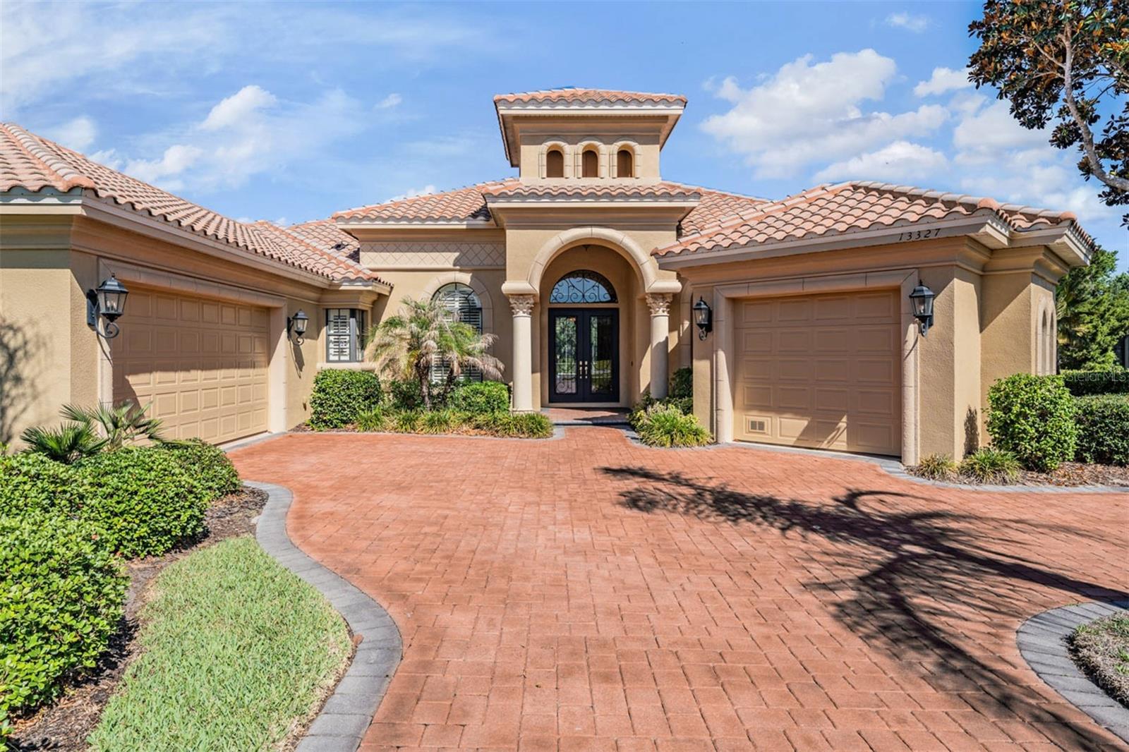 Hip roof with ceramic tile welcomes you home!
