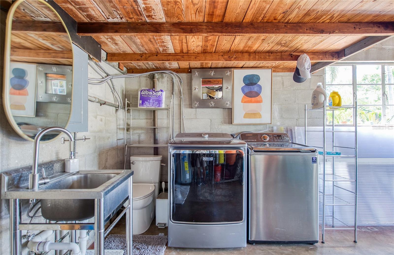 CASA BAJA Washer, Dryer, Utility Sink and Toilet Area Under the Overhead Storage Loft