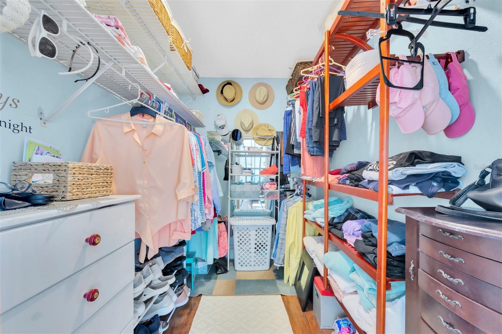 WALK IN CLOSET IN PRIMARY BEDROOM