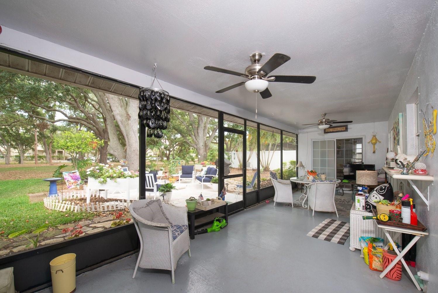 SCREENED LANAI OVERLOOKING BACKYARD
