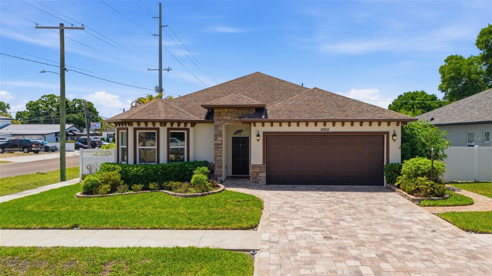 Front Elevation wtih pavered driveway