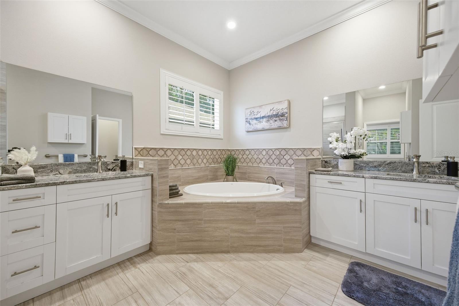Primary Bathroom with soaking tub and double vanities