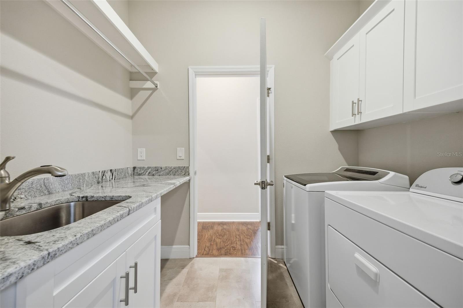 Laundry room just in off the garage entry