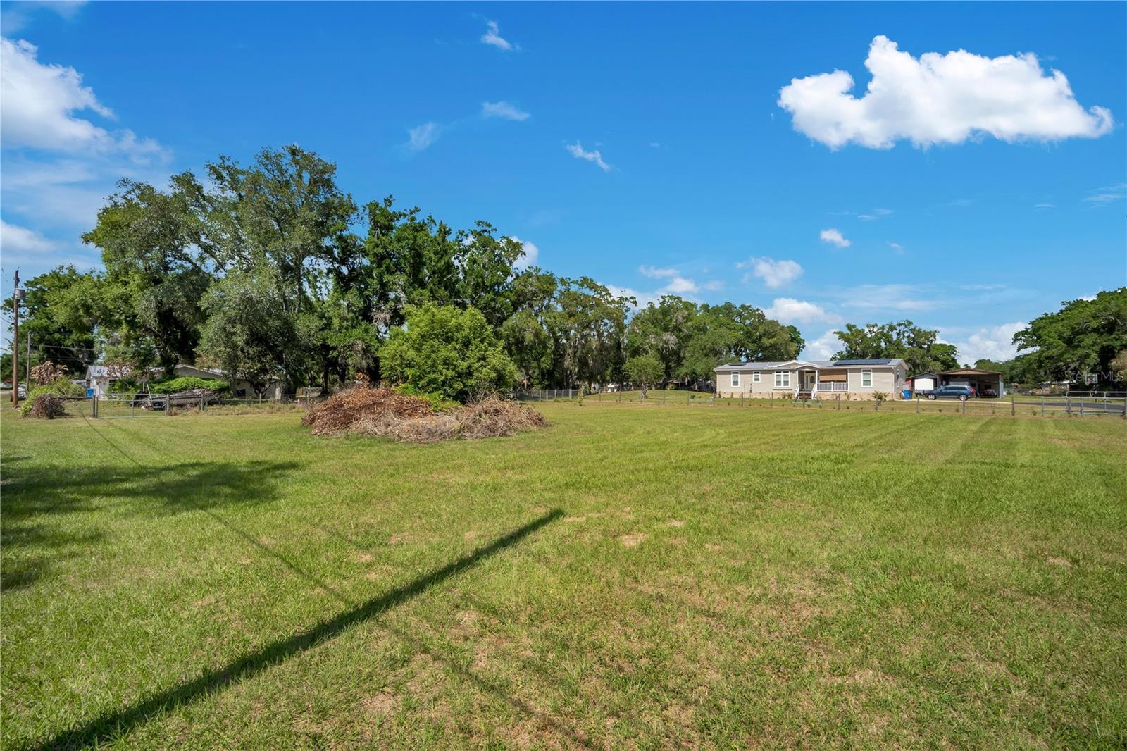 Cleared area at the back of the property.