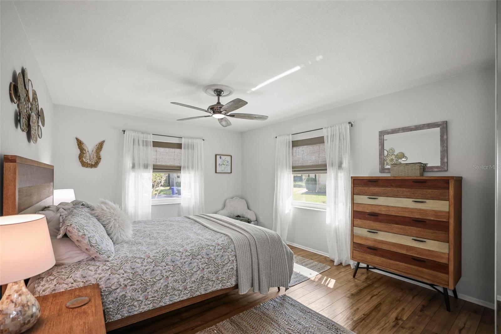 Primary Bedroom with engineered hardwood flooring