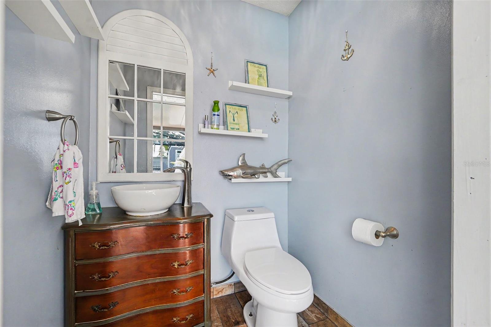 Pool Half Bath, access from enclosure.