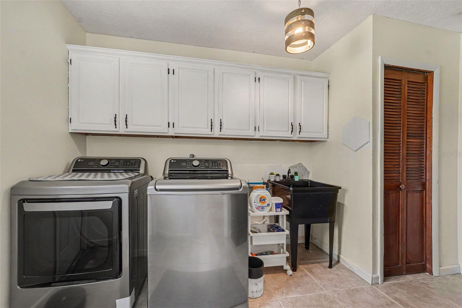Dedicated Laundry room and storage