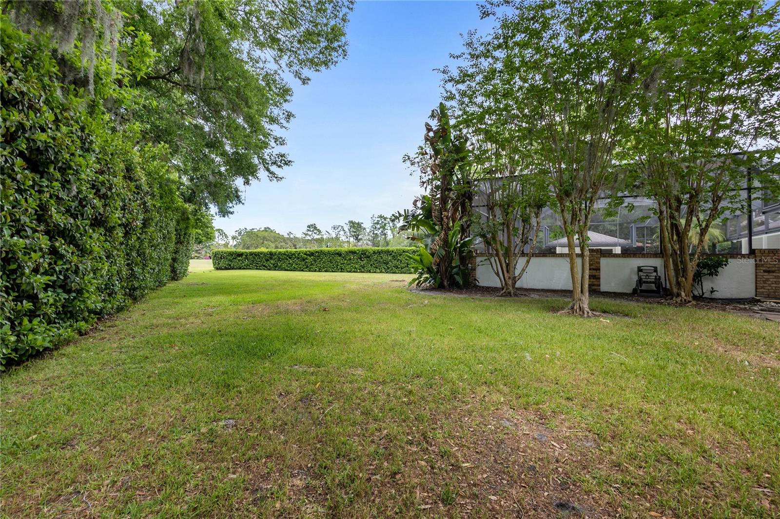 side yard looking to backyard