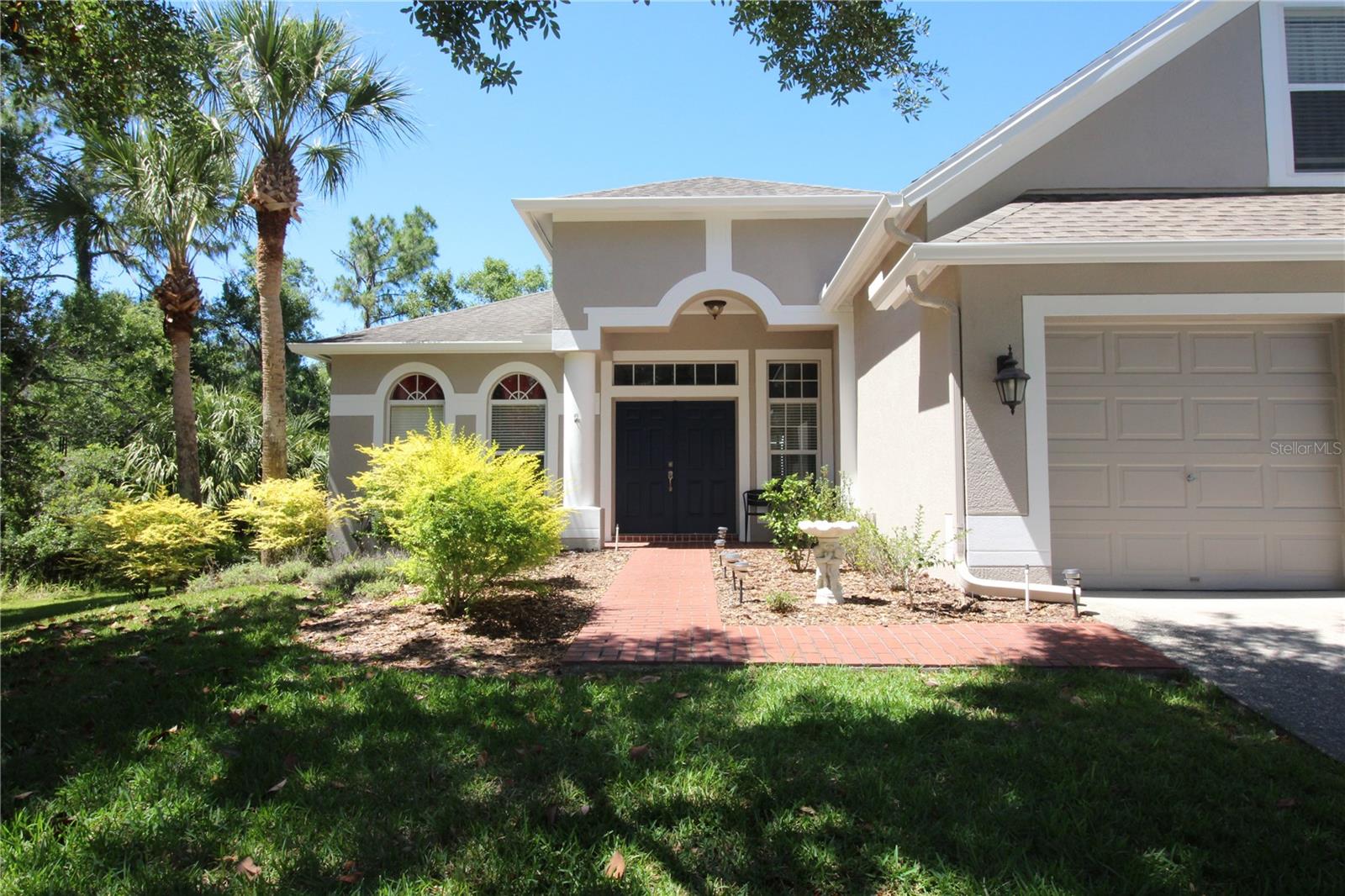 Paver entry sidewalk and front porch