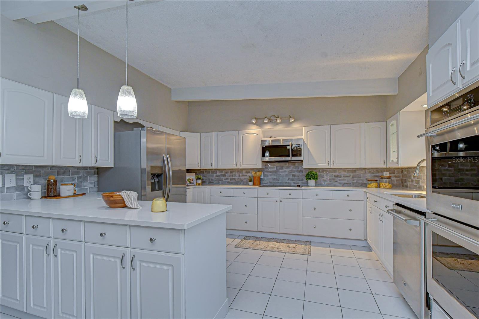 This kitchen has infinite counter space and cabinets!