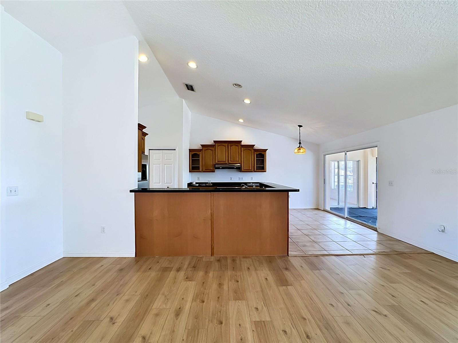 Custom kitchen flowing into main living space