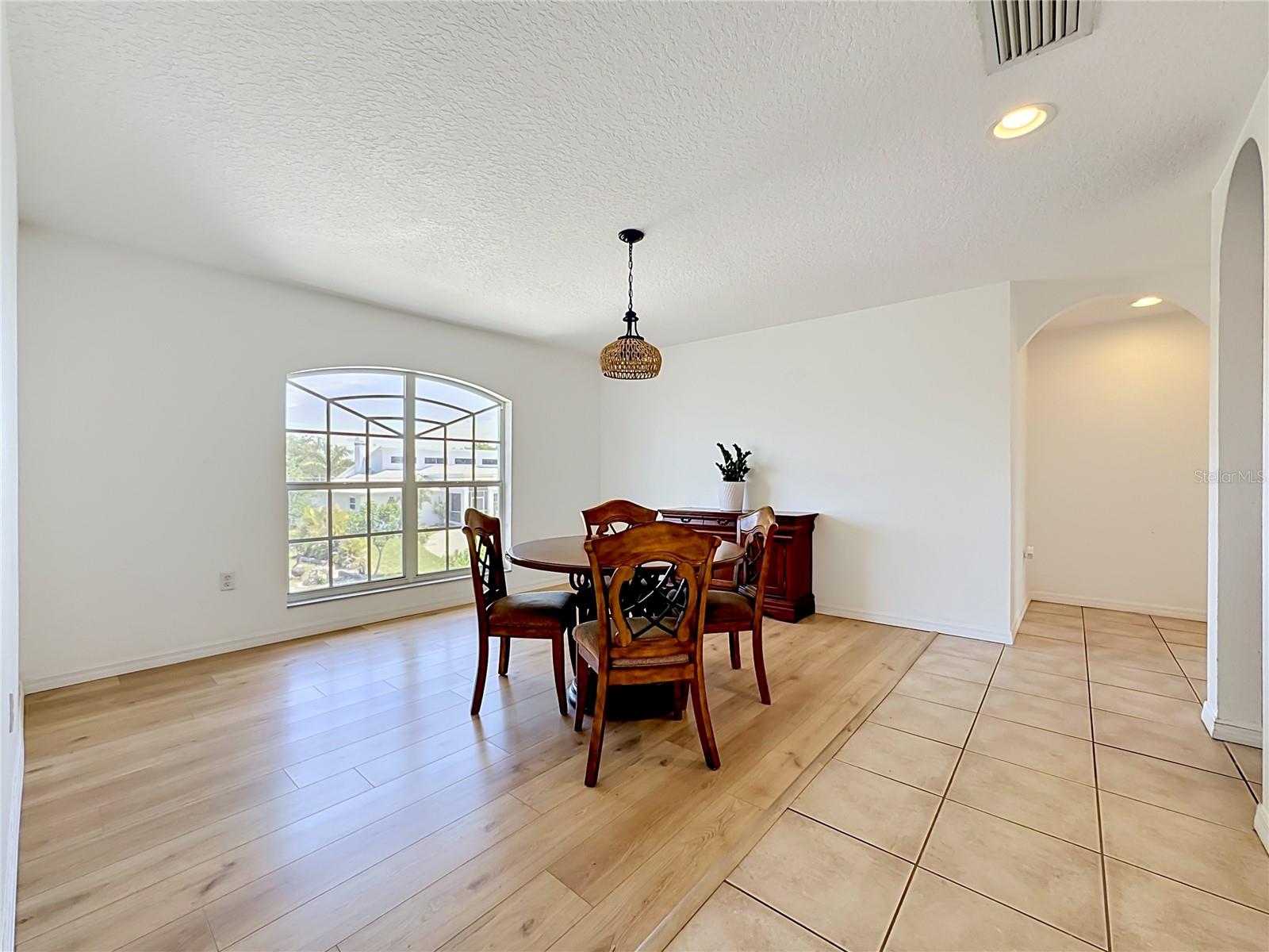 Formal dining area with natural light