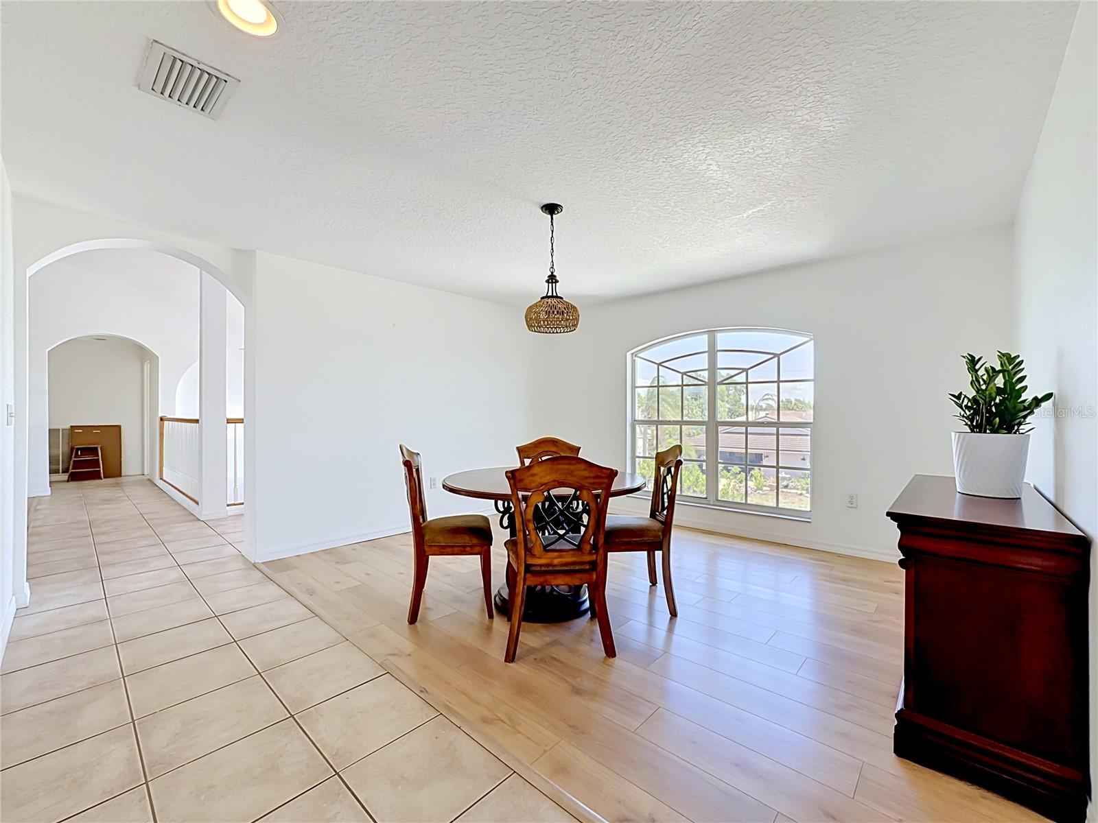 Formal dining area with natural light